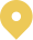 Gold location pin icon with a black center on a transparent background