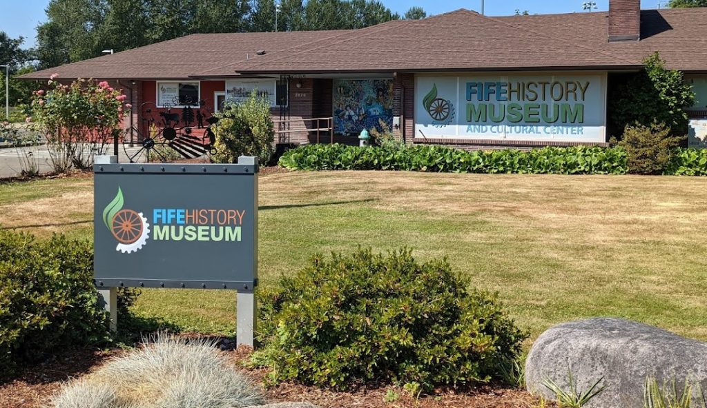 Exterior view of the Fife History Museum and Cultural Center with building signage and front garden